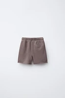 LOGO PLUSH SHORTS