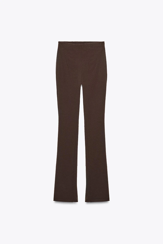 ZIPPERED STRETCH LEGGINGS