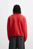 QUARTER-ZIP SWEATSHIRT