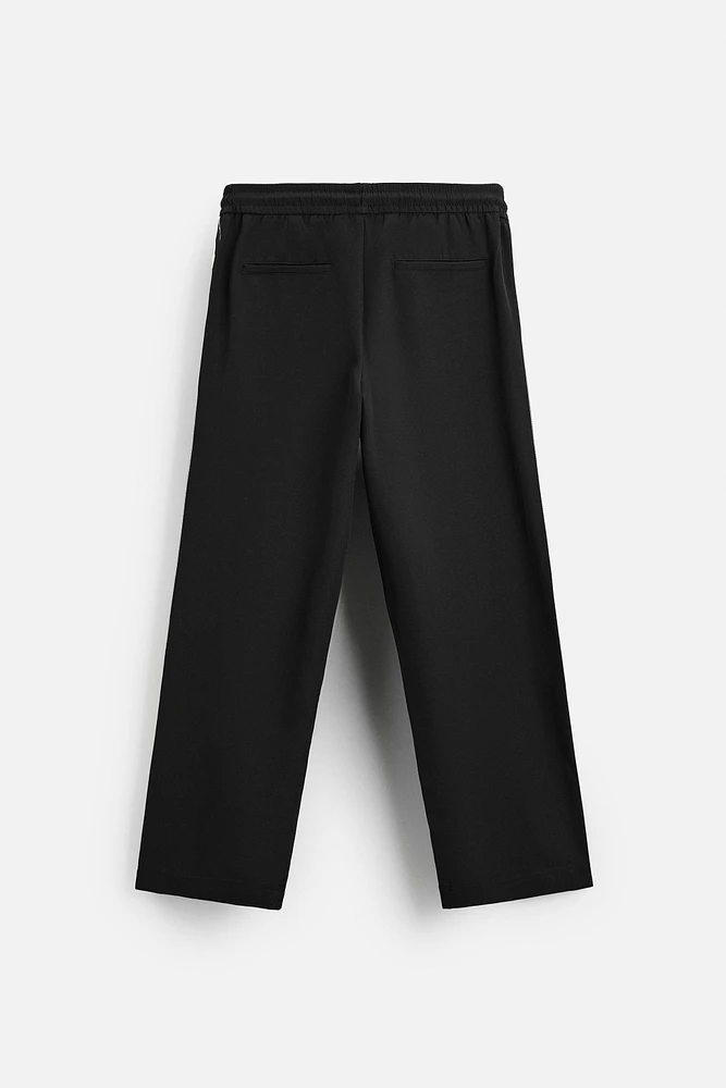 TECHNICAL PANTS WITH BANDS