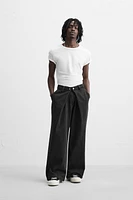 PLEATED BAGGY JEANS
