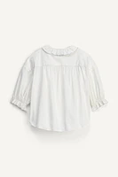 LIMITED EDITION RUFFLE TRIM STRIPED SHIRT
