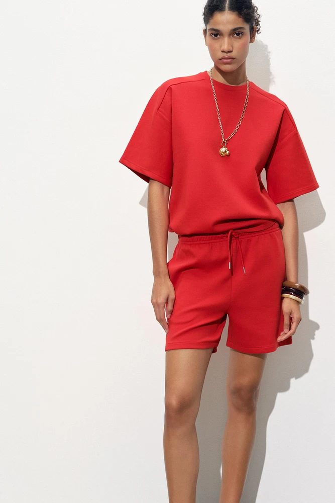SHORT EN MAILLE SURJET