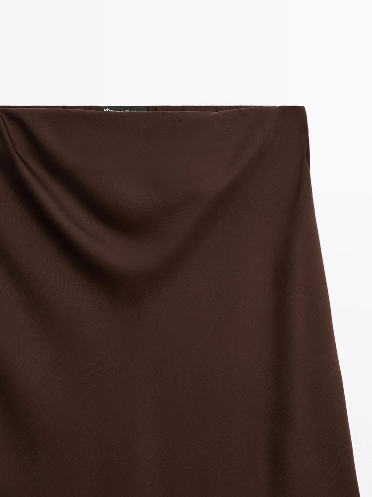 Jupe midi fluide en tissu satiné