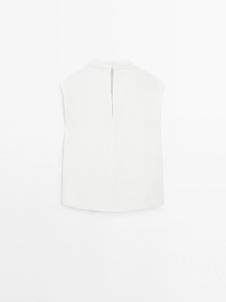 Blouse fluide à col drap