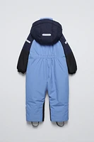 COMBINAISON À CAPUCHE DÉPERLANTE ET COUPE-VENT COLLECTION SKI
