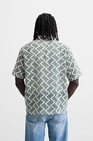 CHEMISE STRUCTURÉE AJOURÉE
