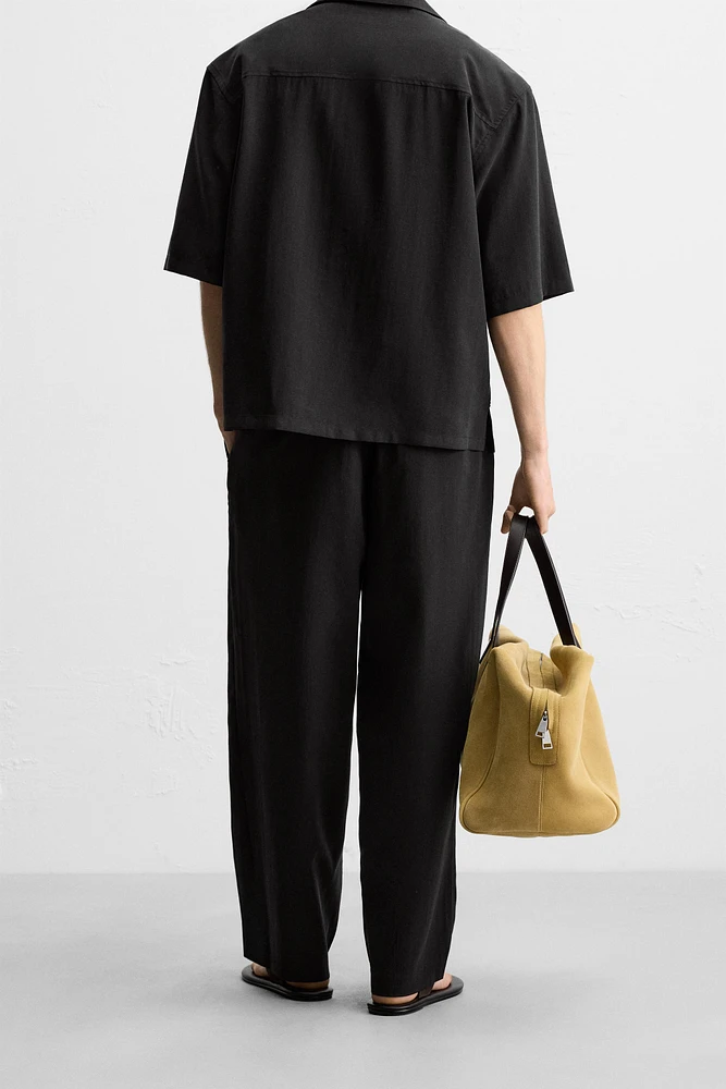FLOWY PLEATED PANTS