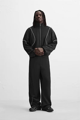 VESTE TECHNIQUE CONTRASTÉE