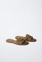 SUEDE CROSS STRAP FLAT SANDALS