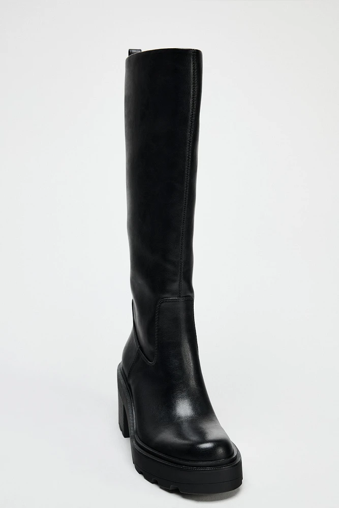 BOTTES À TALONS ET SEMELLE TRACK