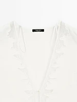 Flowing blouse with lace detail