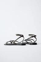 STUDDED LEATHER SANDALS