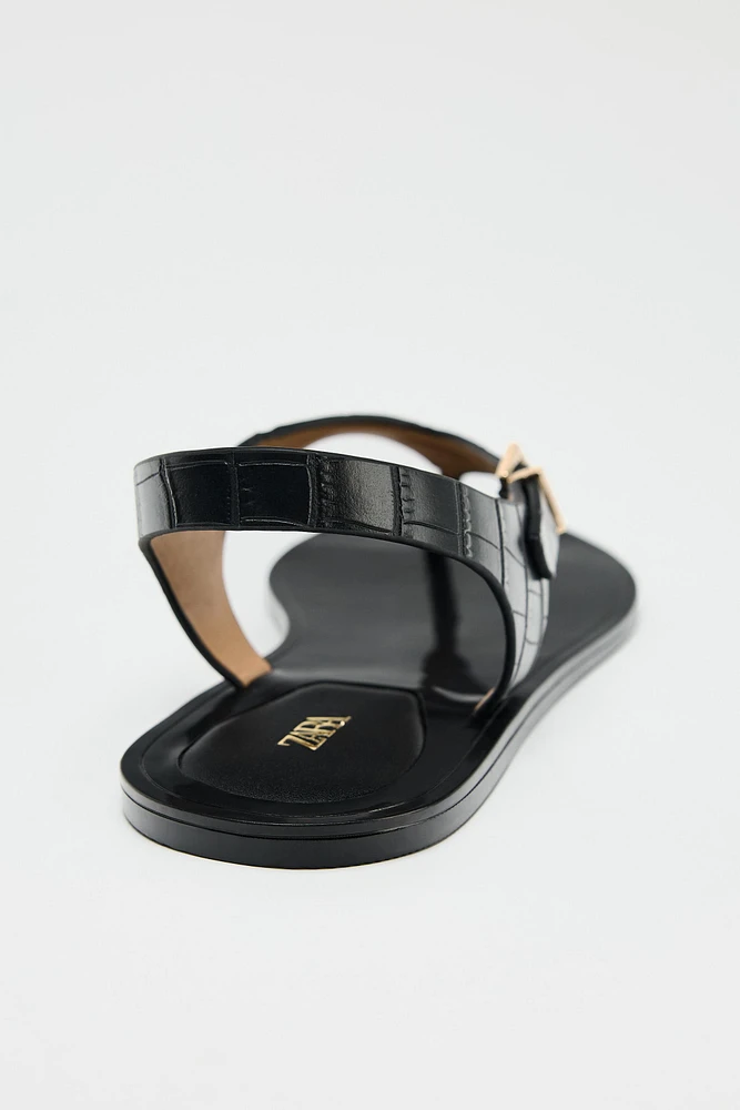EMBOSSED FLAT SANDALS