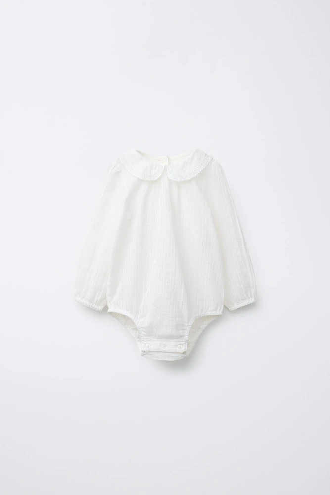 BOUND NECKLINE BODYSUIT