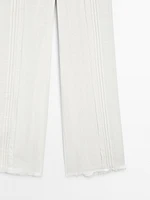 Cotton blend trousers with embroidered details
