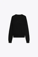 PULL BASIQUE EN MAILLE UNIE