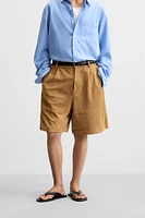 PLEATED SUEDE SHORTS