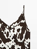 Flowing strappy animal print top