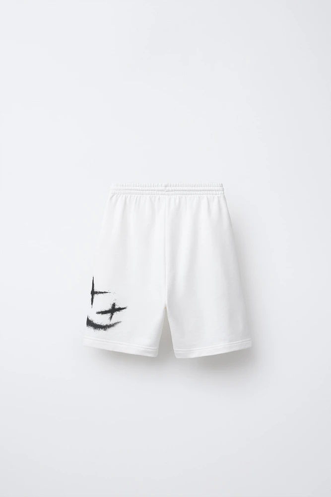 GRAFFITI PRINT BERMUDA SHORTS