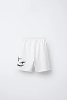 GRAFFITI PRINT BERMUDA SHORTS