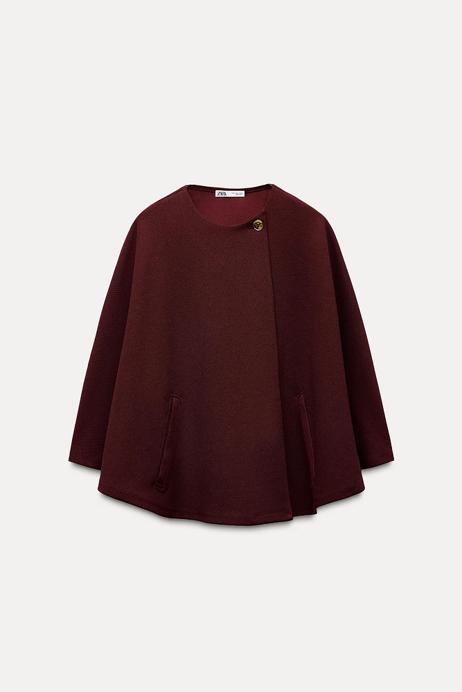 BUTTON CAPE