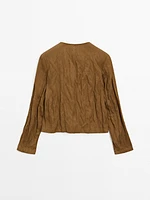 Short jacket with fabric detail