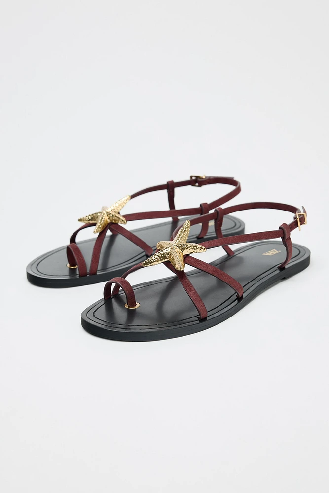 STRAPPY SANDALS WITH METALLIC DETAIL