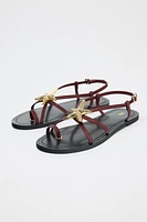 STRAPPY SANDALS WITH METALLIC DETAIL