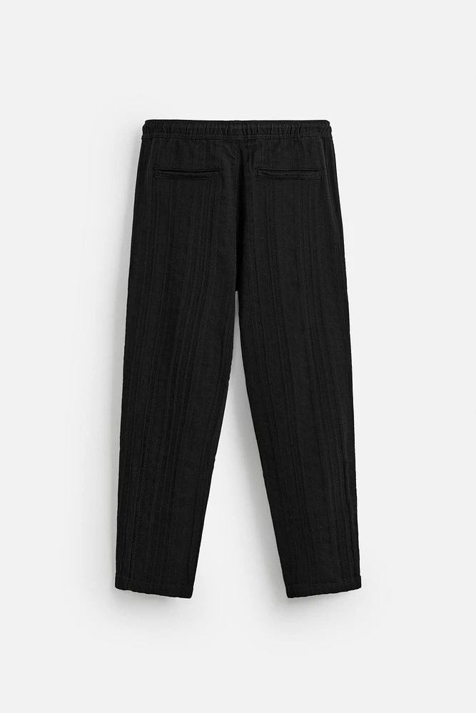 TEXTURED RELAXED FIT PANTS