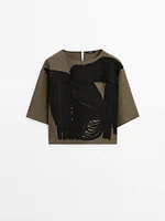 Flowing blouse with contrasting ribbons