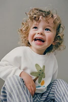 CURLY PALM SWEATSHIRT