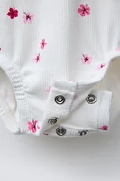 TWO-PACK OF FLORAL PRINT BODYSUITS