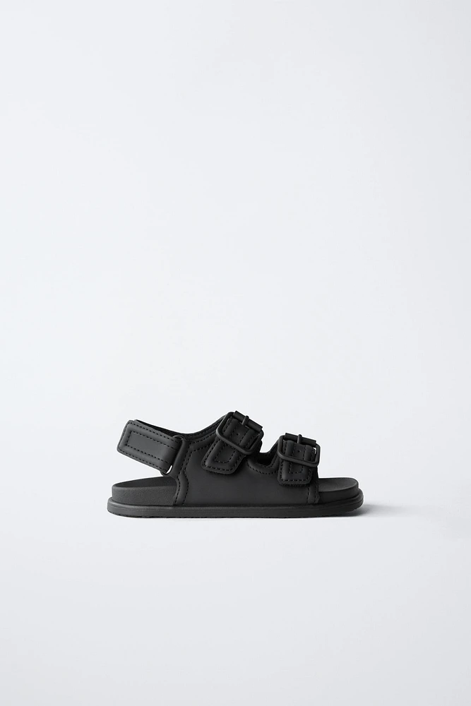 BUCKLED SANDALS