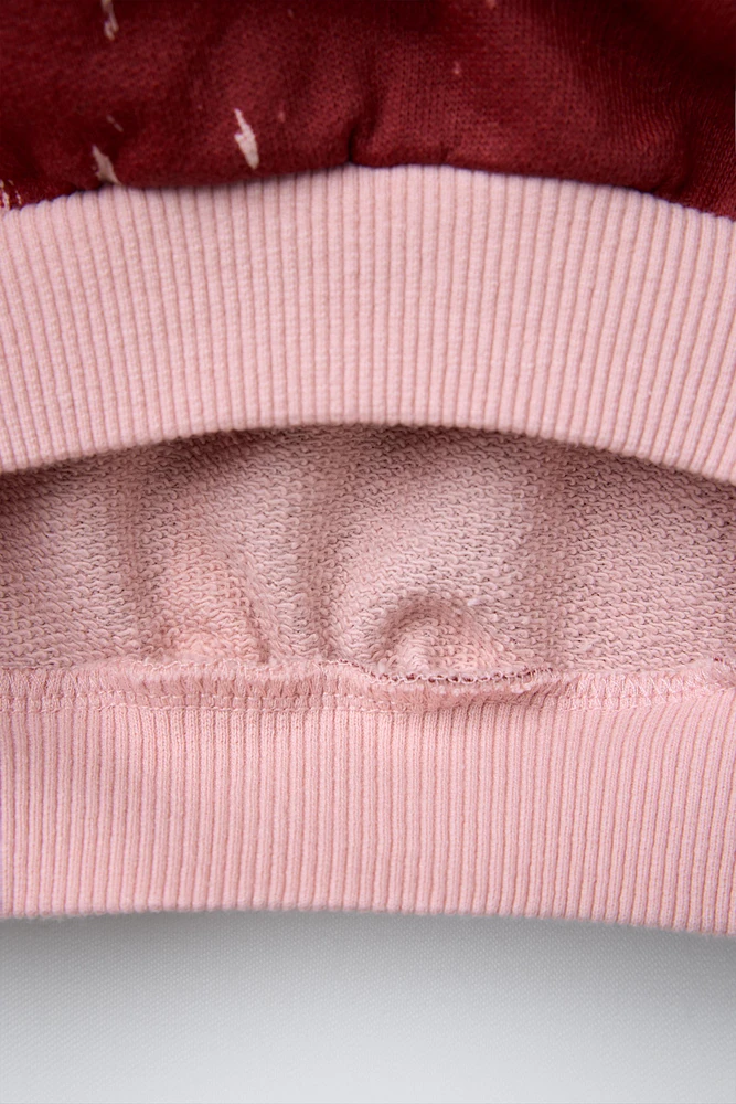 HEART PRINT SWEATSHIRT