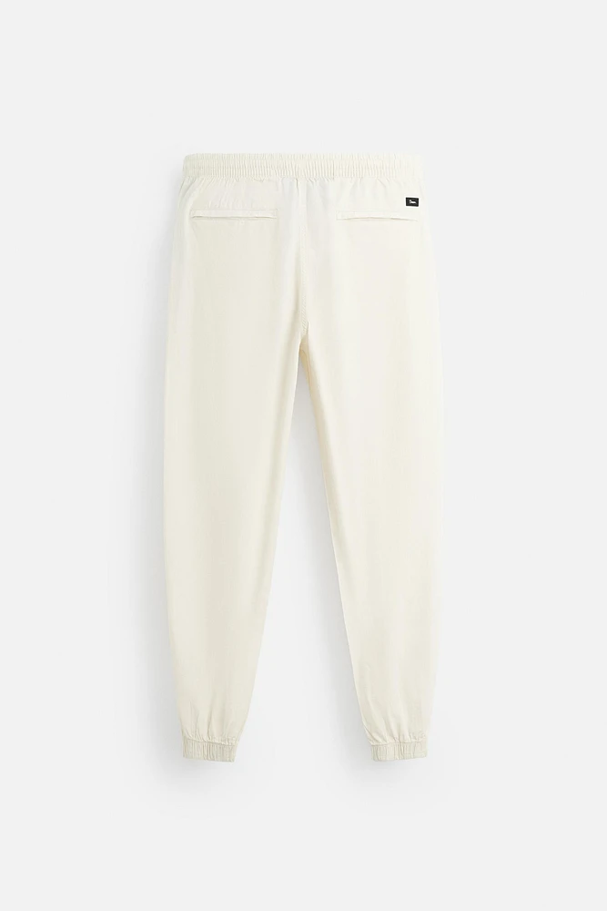 PANTALON DÉLAVÉ AVEC TAILLE JOGGING