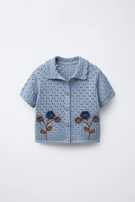 POLO EN MAILLE À FLEURS CROCHET