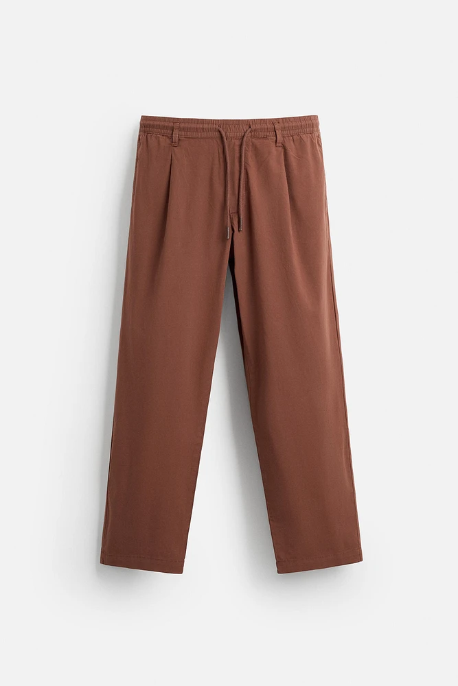 PLEATED POPLIN PANTS