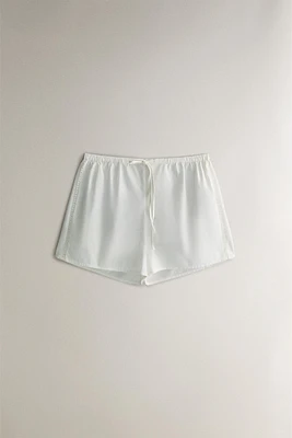 GATHERED SHORTS WITH LACE