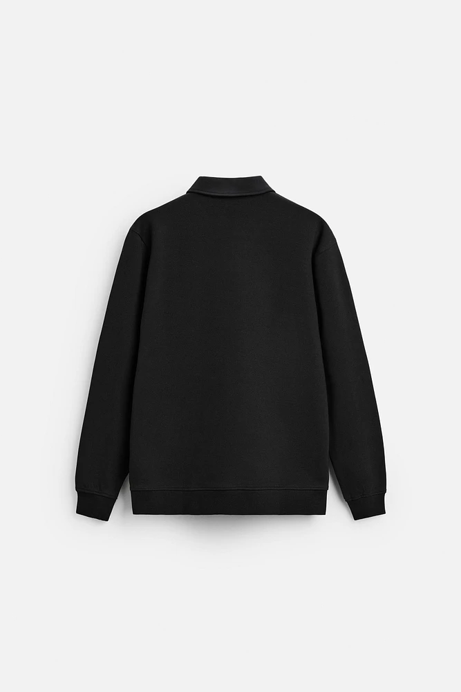 INTERLOCK POLO QUARTER-ZIP SWEATSHIRT