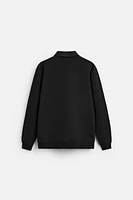 INTERLOCK POLO QUARTER-ZIP SWEATSHIRT