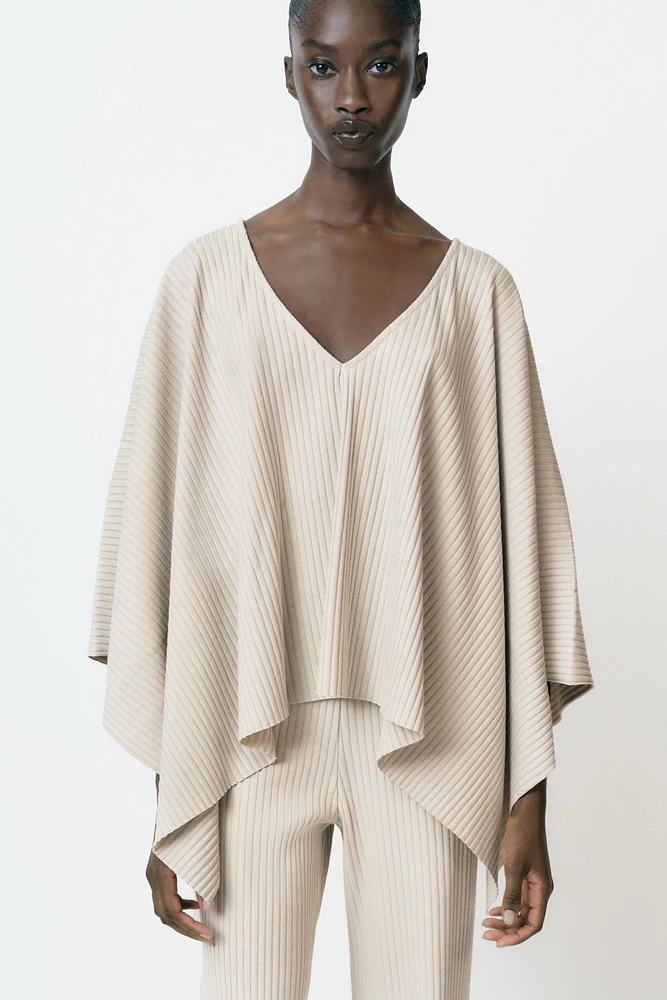 ASYMMETRIC RIBBED CAPE