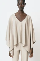 ASYMMETRIC RIBBED CAPE