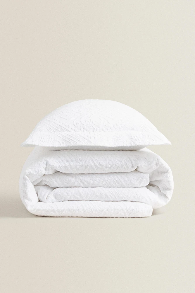 COTTON BEDSPREAD WITH A GEOMETRIC DESIGN