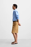 PLEATED SUEDE SHORTS