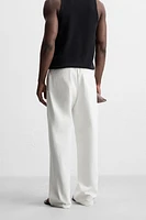 PANTALON COUPE DÉCONTRACTÉE CEINTURE