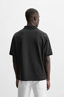 TEXTURED ZIP POLO SHIRT