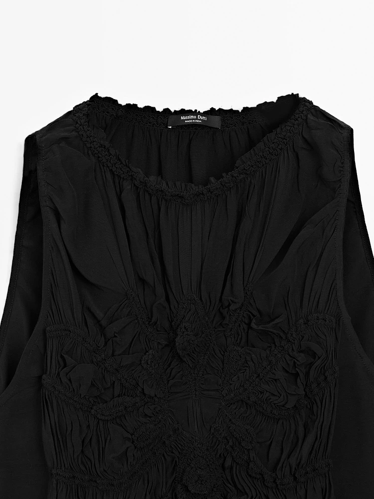 Flowing halter top with gathered detail