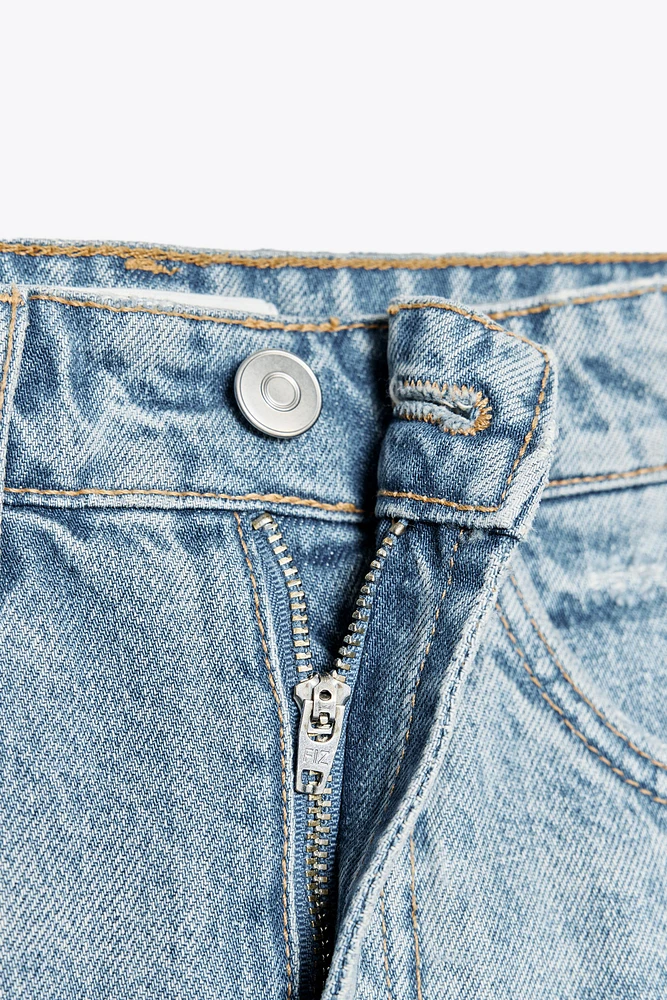 MINI JUPE EN JEAN TRF DÉCHIRÉE