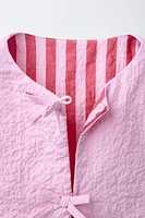 TEXTURED VEST WITH HEART POCKETS